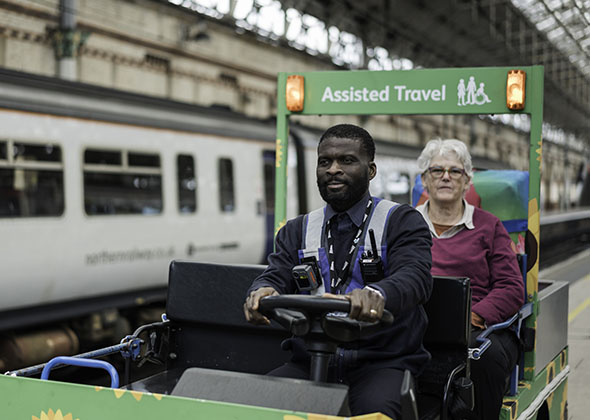 passenger in an assisted travel cart