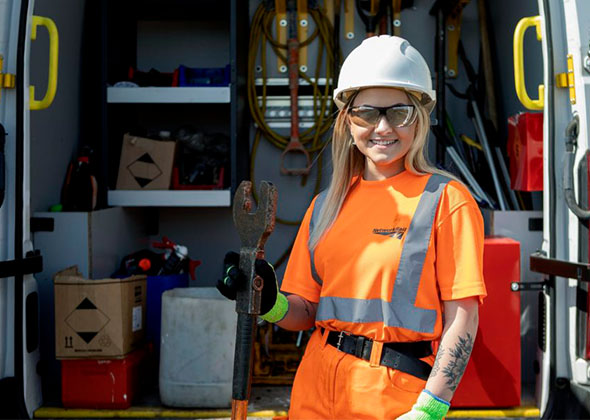 Network Rail employee holding a spanner